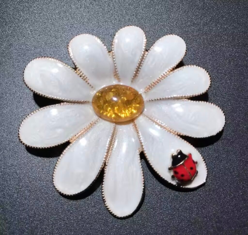 Pearl daisy and ladybug brooch