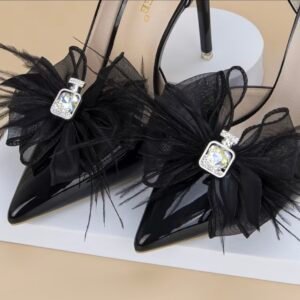 Black feather shoe brooch