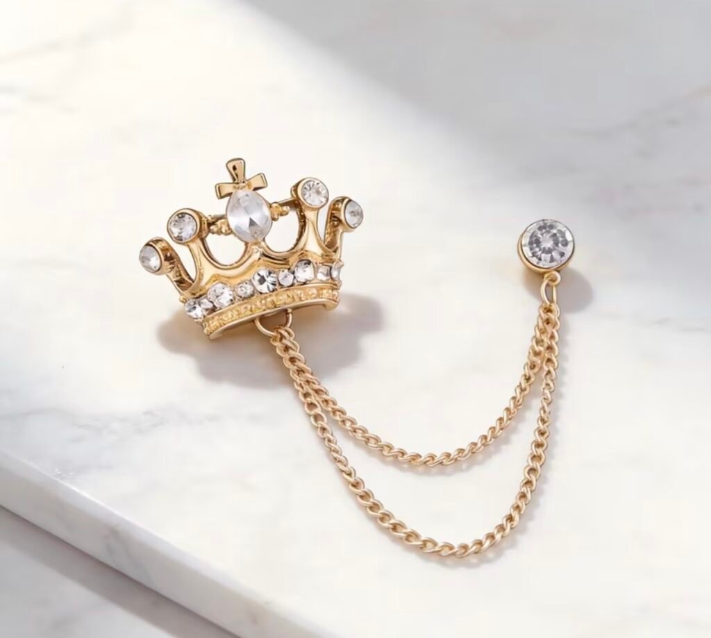 Gold crown chain brooch