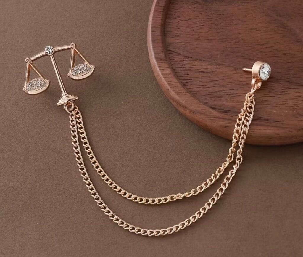 Scales of justice chain brooch